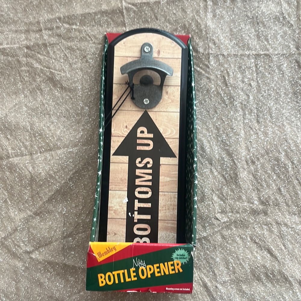 Bottle opener with catch tray